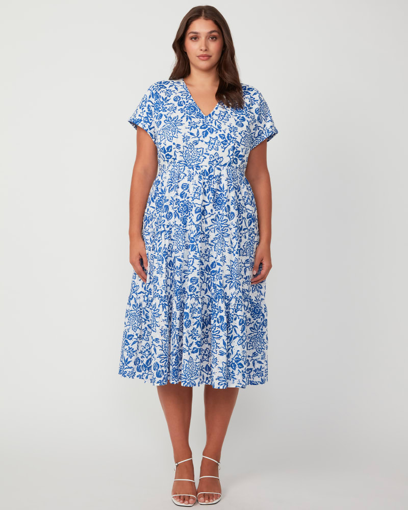 Front of a model wearing a size 24W Cote d'Azur Midi Dress in Milk/Azure by Estelle. | dia_product_style_image_id:349799